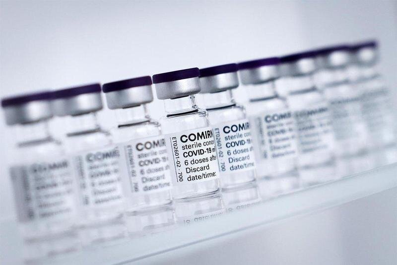  FILED - 30 April 2021, Schleswig-Holstein, Reinbek: Vials of BioNTech/Pfizer's Comirnaty vaccine are lined up at Allergopharma's production facilities in Reinbek near Hamburg. Canada is to allow 12 to 15 year-olds to receive the vaccine against Covid-19 m - Christian Charisius/dpa/Pool/dpa 