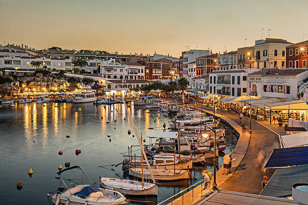 Sunset in Es Castells bay in Menorca, Balearic Island, Spain.