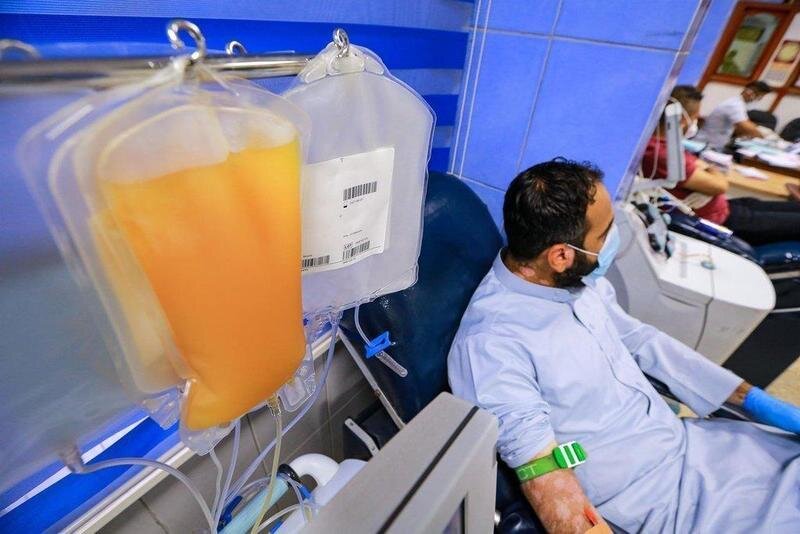  recovered coronavirus (COVID-19) patient donates blood samples for plasma extraction to help critically ill patients at the National Blood Transfusion Center. 