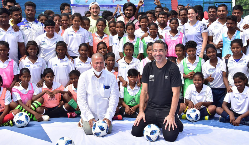 <p> Mr. Youri Djorkaeff, CEO - FIFA Foundation and Dr. Achyuta Samanta, Founder, KIIT & KISS amidst the football trainees during the lunch of FIFA Football for School Programme at KISS - KIIT/PR NEWSWIRE </p>