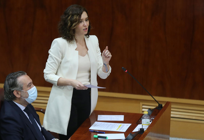 <p> La presidenta de la Comunidad Madrid, Isabel Díaz Ayuso, interviene en una sesión plenaria en la Asamblea de Madrid, a 24 de marzo de 2022, en Madrid (España). El pleno gira en torno al debate sobre el Proyecto de Ley de medidas urgentes para el impulso d - Isabel Infantes - Europa Press </p>