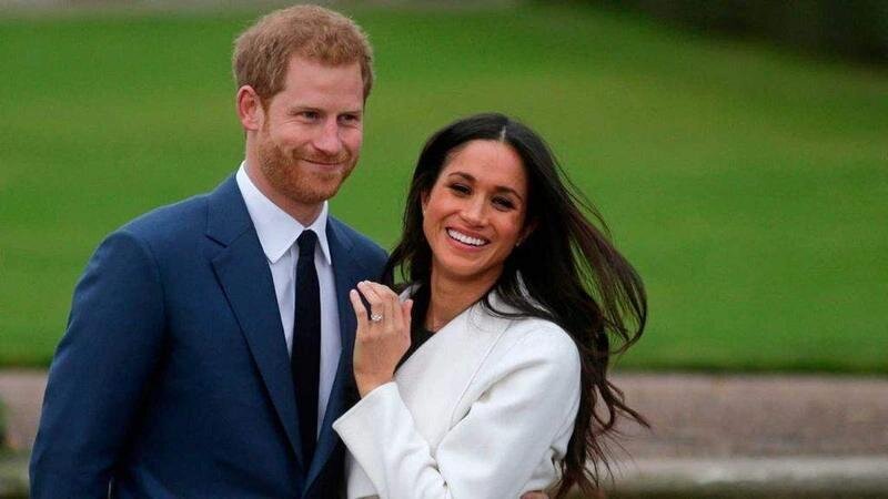 <p> El príncipe Henry y Meghan Markle </p>